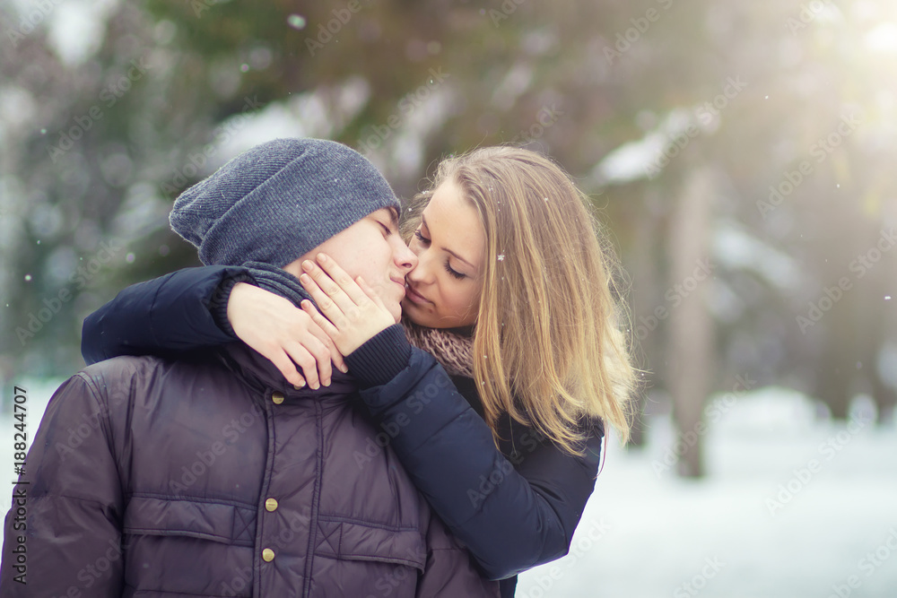 Fototapeta premium Happy Young Couple in Winter Park