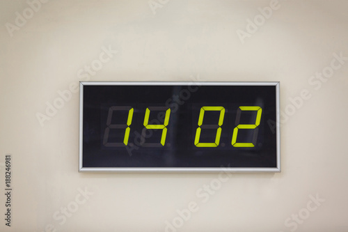 Black digital clock on a white background showing time Valentine's