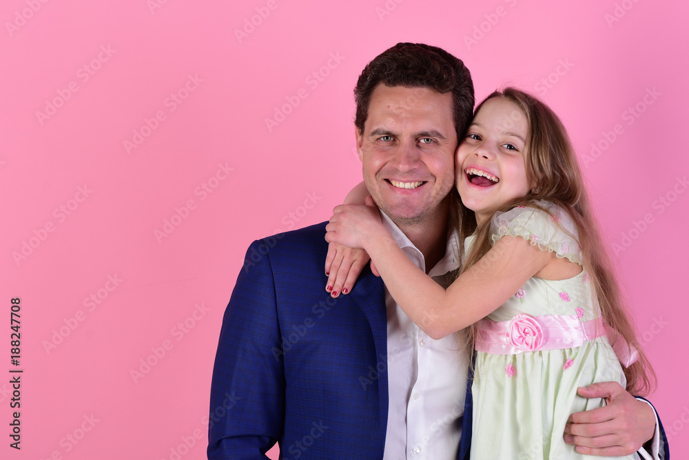 Girl and man with happy smiling faces on pink background Girl and man with happy smiling faces on pink background