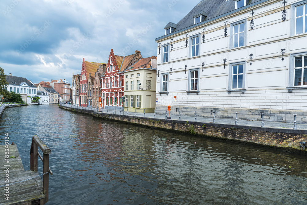 Old houses along the river in Bruges, Belgium Old houses along the river in Bruges, Belgium