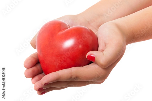Hands holding shiny heart