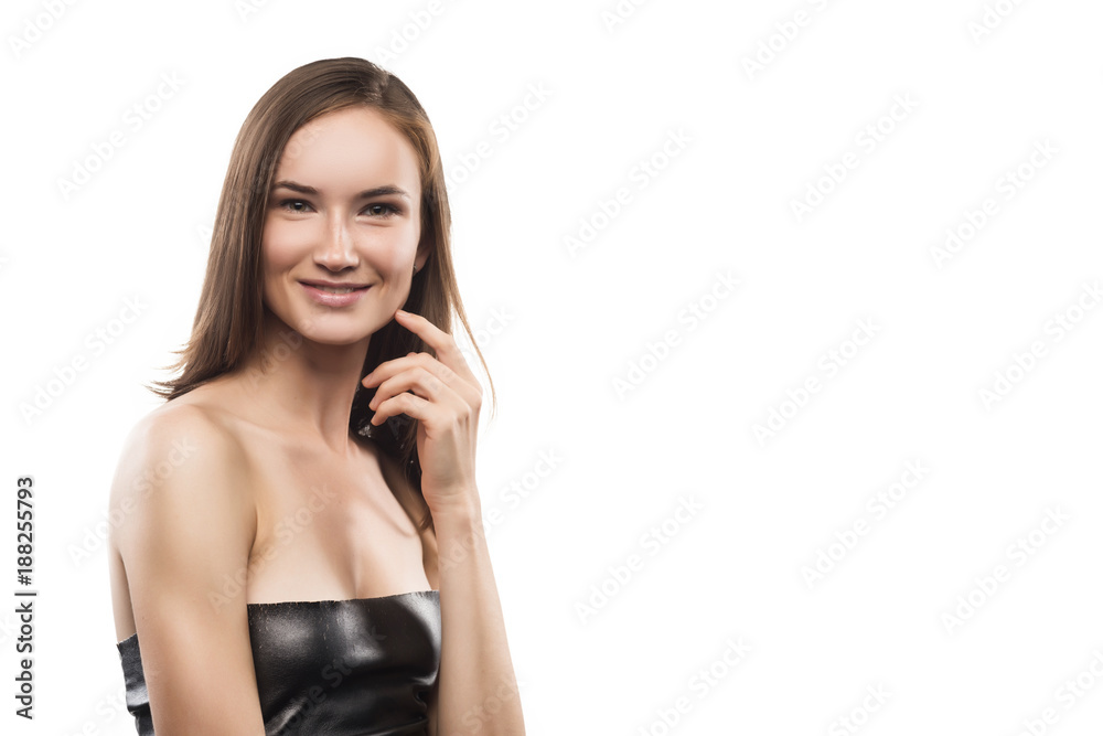 The beautiful naughty smiling girl touches a cheek. The beautiful naughty smiling girl touches a cheek.