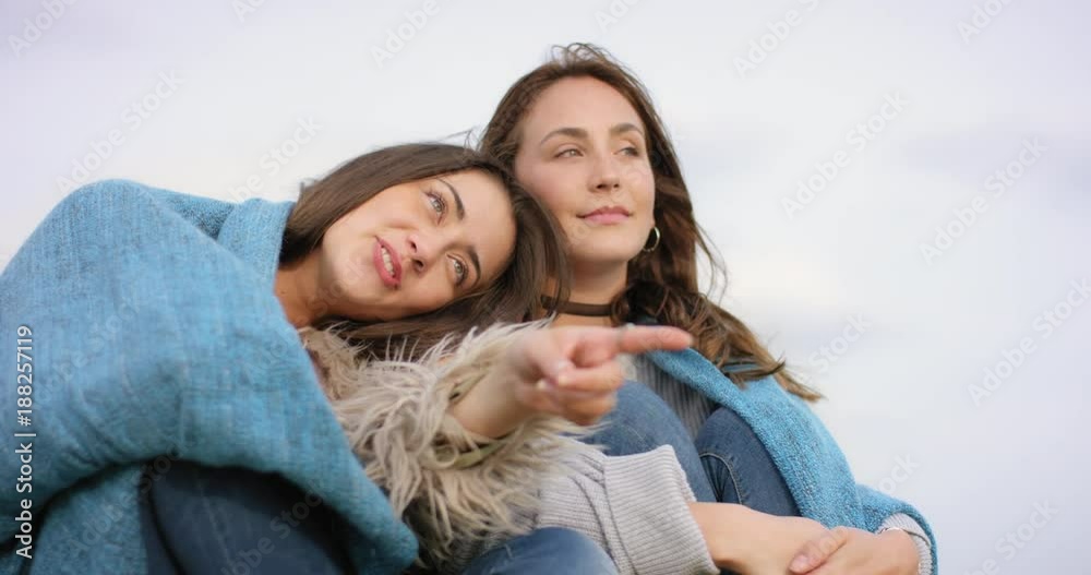 Young woman is resting on her friends shoulder Young woman is resting on her friends shoulder