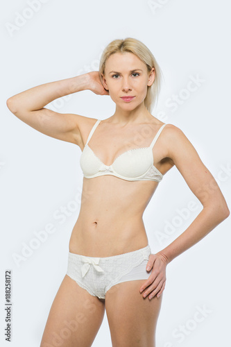 Beautiful slim tanned woman in underwear