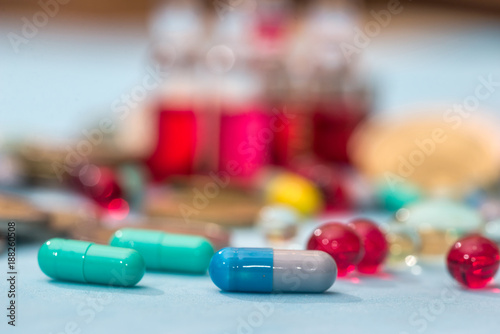 Medicine pills isolated on blue background