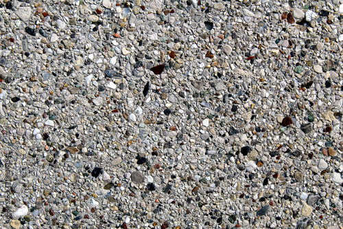 Photos Smooth surface of an artificial conglomerate rock concrete cement wall