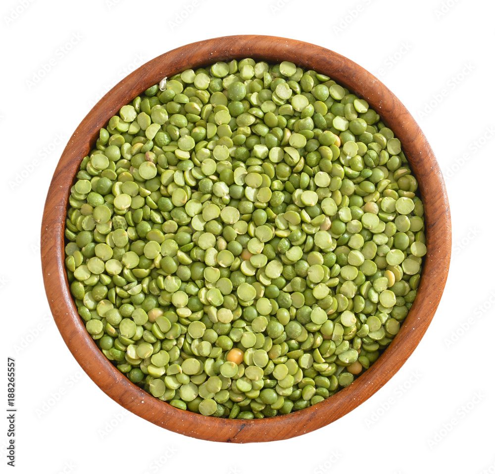 Mung beans in a wooden bowl on a white background. Mung beans in a wooden bowl on a white background.