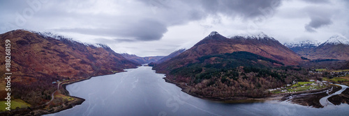 landscape view of scotland and glencoe in winter from an aerial viewpoint in panoramic landscape format