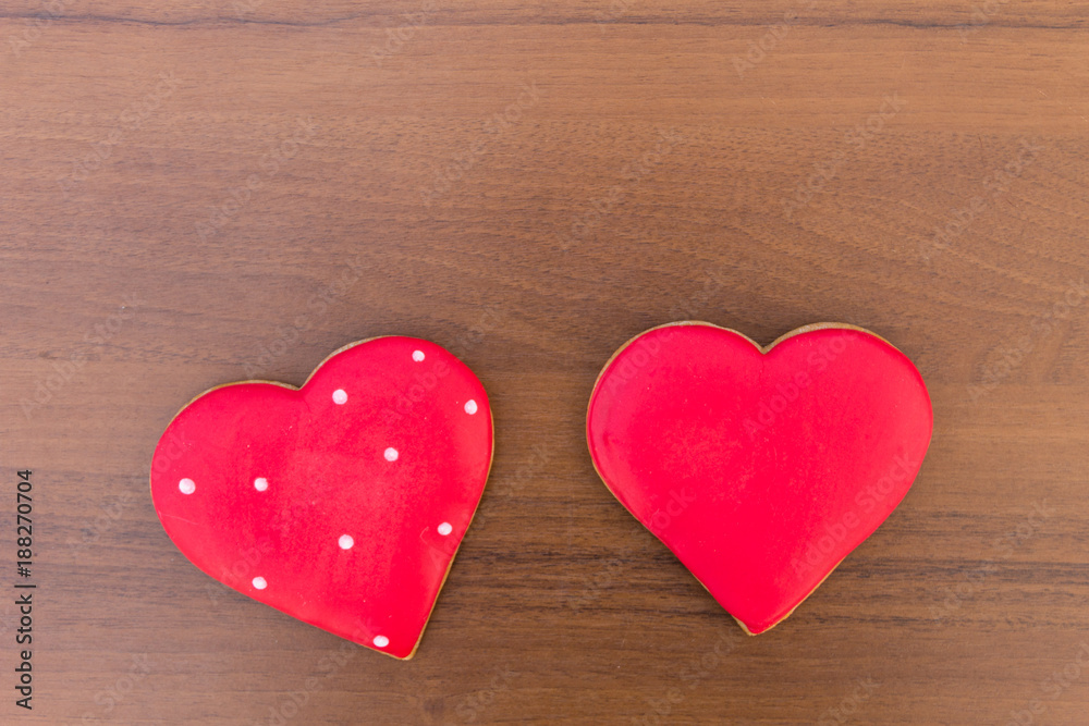 Heart shaped cookies for valentine day on wooden table Heart shaped cookies for valentine day on wooden table