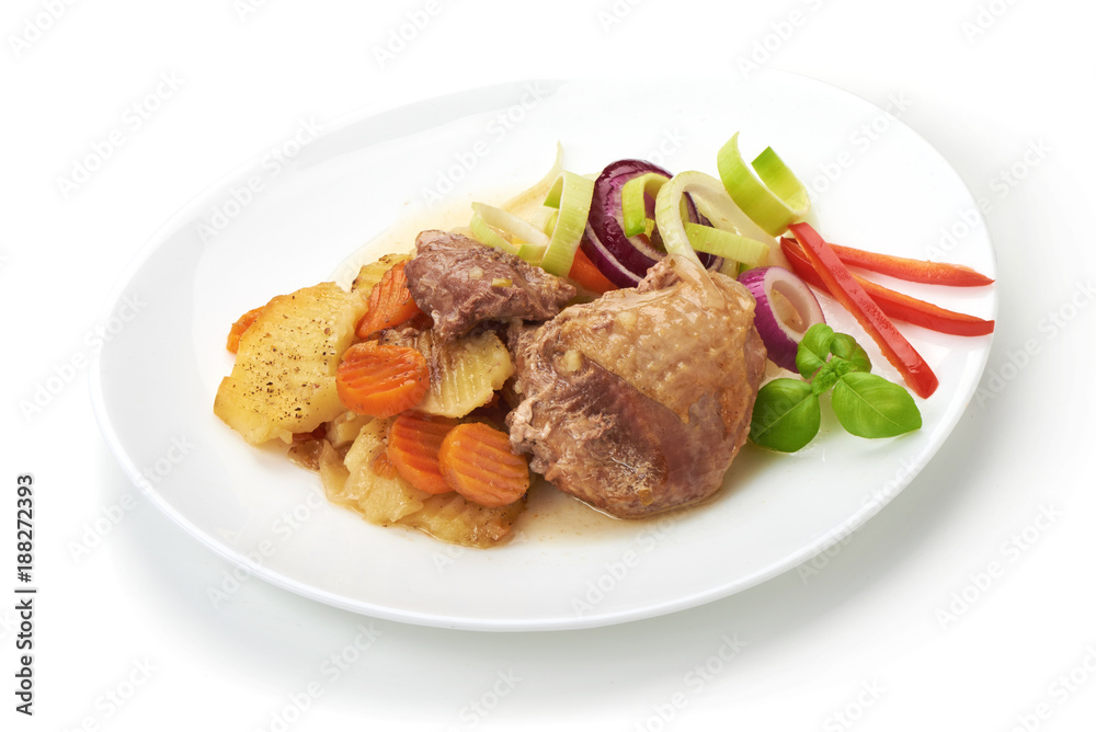Baked turkey meat with sliced vegetables, isolated on white background. Baked turkey meat with sliced vegetables, isolated on white background.
