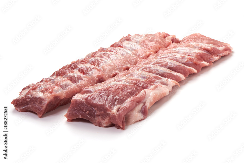 Fresh raw pork loin with ribs, close-up, isolated on white background. Fresh raw pork loin with ribs, close-up, isolated on white background.