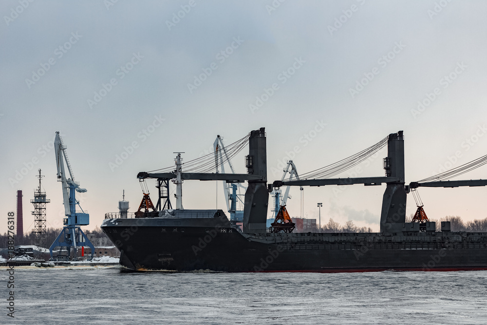 Naklejka premium Black cargo ship