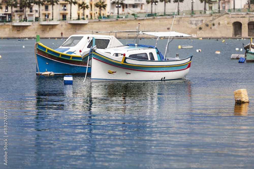 Beautiful colored small fishing boats in Marsaskala, Malta, Beautiful colored small fishing boats in Marsaskala, Malta,