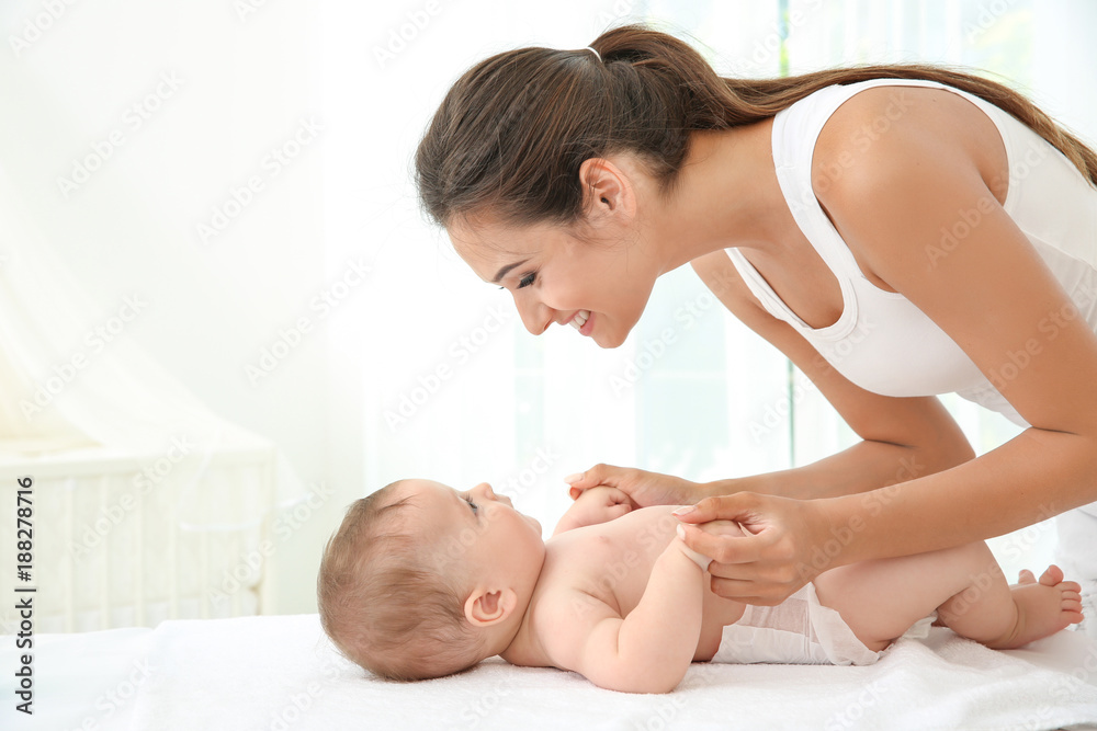Mother and cute baby after bathing at home Mother and cute baby after bathing at home