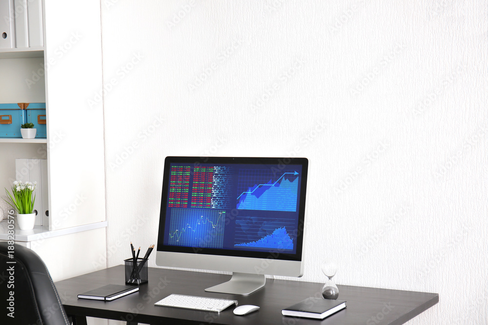 Modern comfortable workplace with computer on desk at home Modern comfortable workplace with computer on desk at home