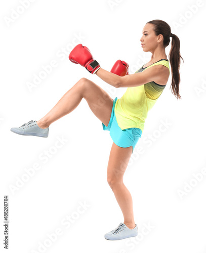 Strong woman in boxing glov...