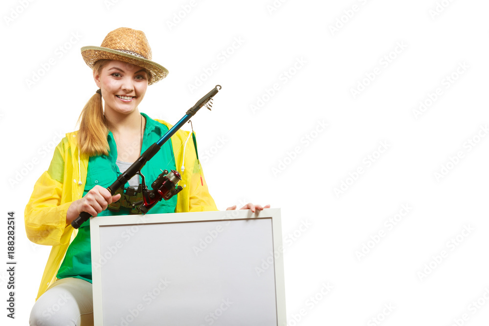 Happy woman with fishing rod holding board