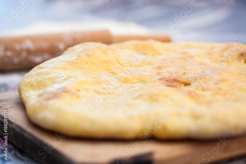 Traditional Georgian pie - khachapuri, is a cake baked in the oven with cheese