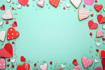 Homemade valentine cookies on mint background