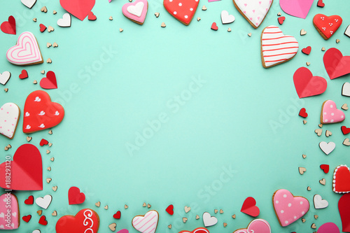 Homemade valentine cookies on mint background