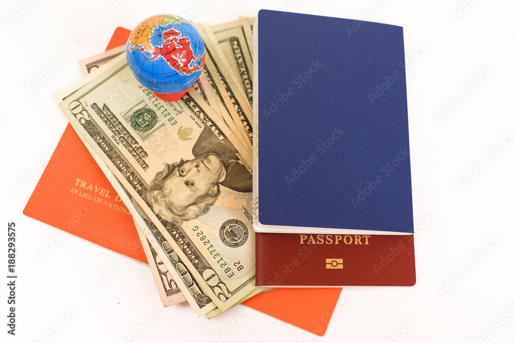 Fototapeta premium Globe and documents with dollars banknote isolated on white background