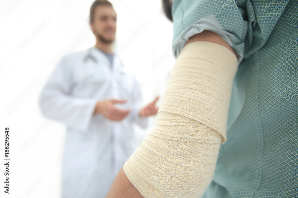 orthopedist talking with the patient. orthopedist talking with the patient.