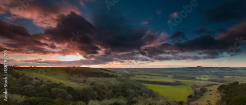 Winter sunset over Old Winchester Hill - an Iron Age fort - from the South Downs, Hampshire, UK photo