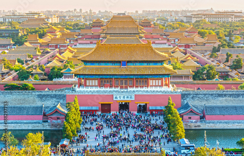 The Palace Museum (Forbidden City). The Gate of Divine Might (Shenwu Gate), people are visiting. Located in Beijing, China. photo