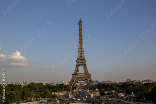 Eiffel Tower at sunset in Paris, France. Romantic travel background. © yusuftatliturk