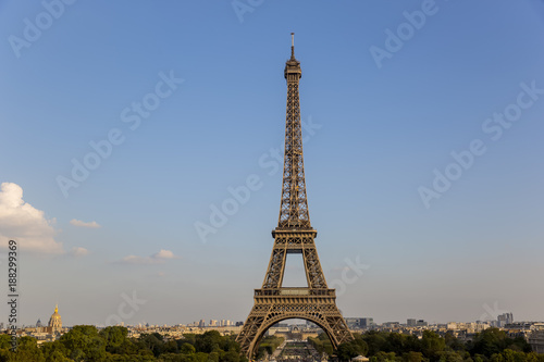 Eiffel Tower at sunset in Paris, France. Romantic travel background. © yusuftatliturk