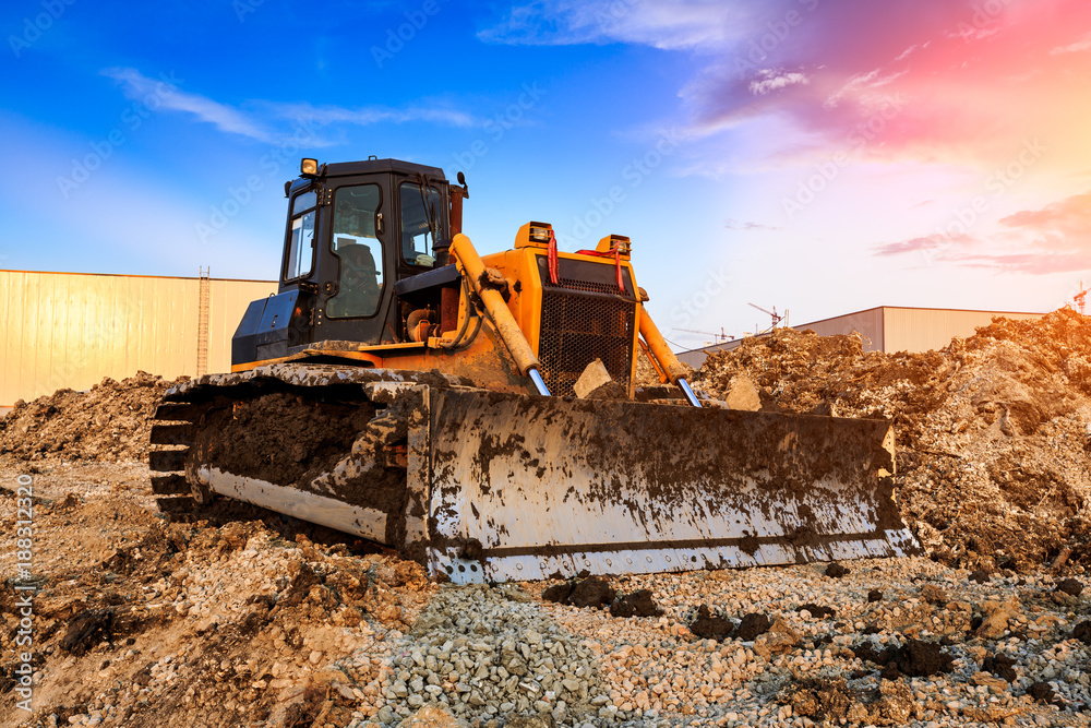 bulldozer at construction site and sunrise landscape bulldozer at construction site and sunrise landscape