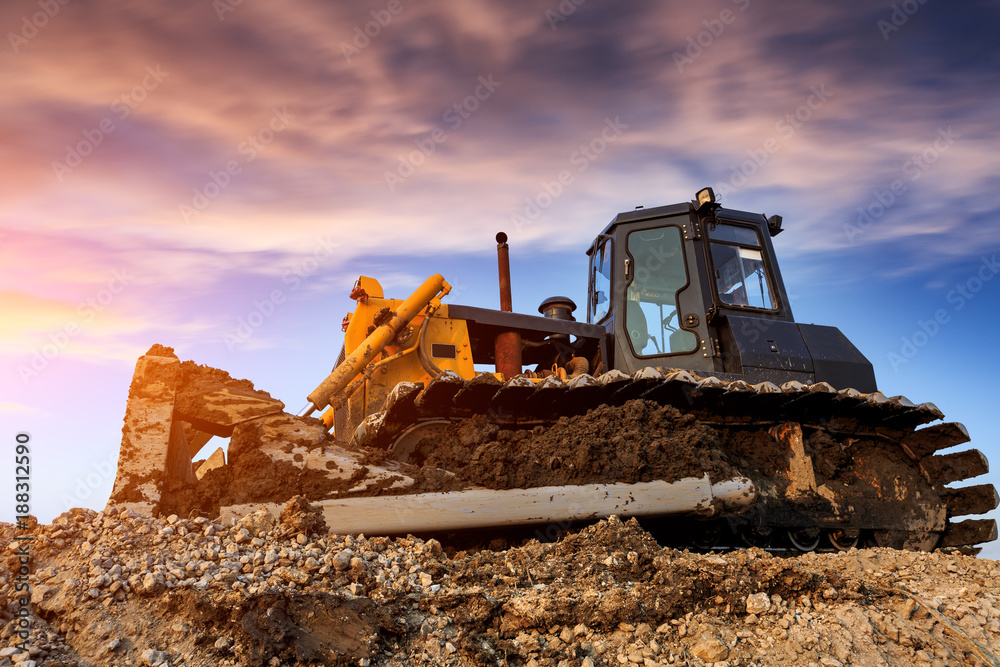 bulldozer at construction site and sunrise landscape bulldozer at construction site and sunrise landscape