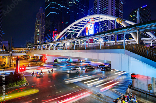 Photography public sky walk and traffic at Chong Nonsi sky train station at night, Bangkok,