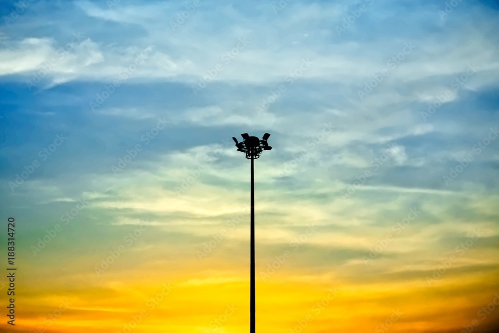 Silhouette of A Street Lighting Pillar in Blue and Orange Sky during the Dusk Silhouette of A Street Lighting Pillar in Blue and Orange Sky during the Dusk