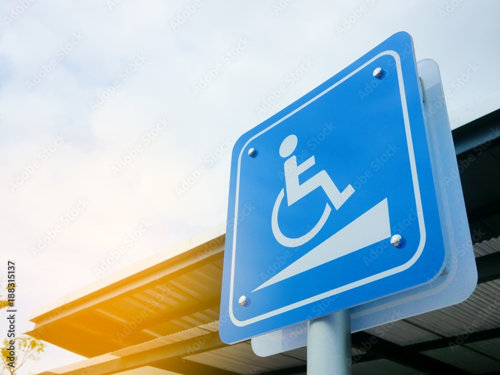 disabled ramp sign in the gas station parking. Stock Photo | Adobe Stock