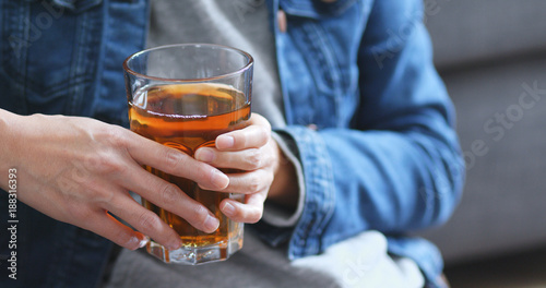 Woman holding hot tea