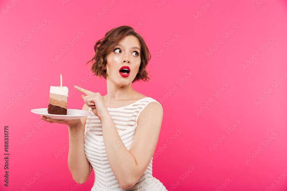 Portrait of a surprised girl holding plate Portrait of a surprised girl holding plate