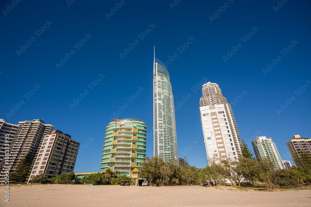 Gold Coast, Queensland/Australia - 15 January 2018: Morning views of Surfers Paradise over the beach on the Gold Coast, Australia. Gold Coast, Queensland/Australia - 15 January 2018: Morning views of Surfers Paradise over the beach on the Gold Coast, Australia.