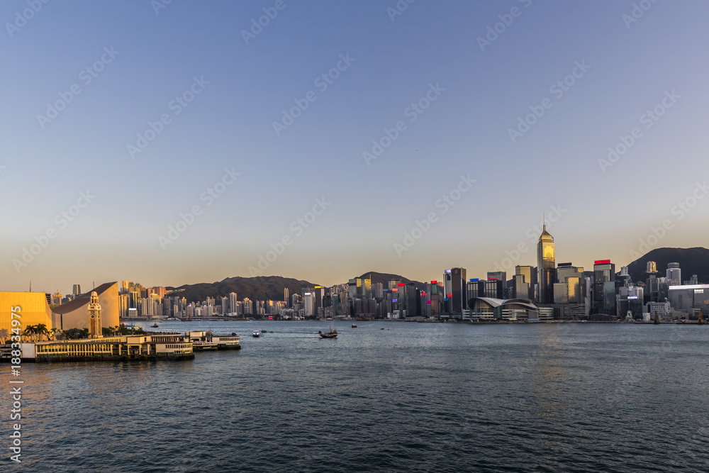 Naklejka premium Victoria Harbor of Hong Kong at twilight