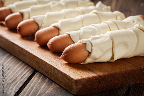 Preparation for baking sausage in puff pastry
