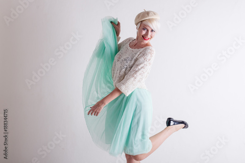 beautiful French blonde in a light dress photo