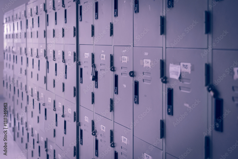 Filing cabinets in office building - violet color tone