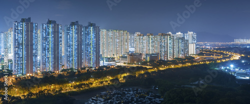 Panorama of residential district of Hong Kong city at night © leeyiutung