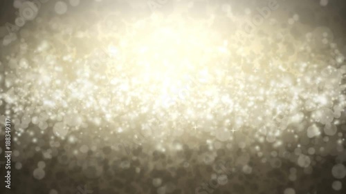 Looped animated background of sparkling glitter texture in gold color. Glamorous glowing sequins in metallic beige gradient