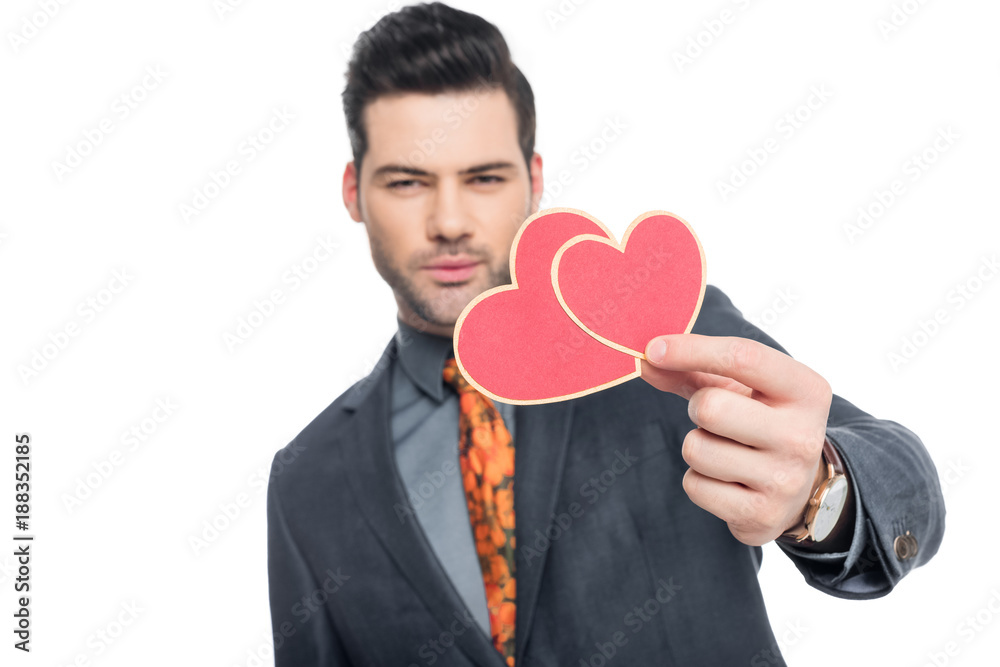 handsome man with valentines greeting card, isolated on white handsome man with valentines greeting card, isolated on white