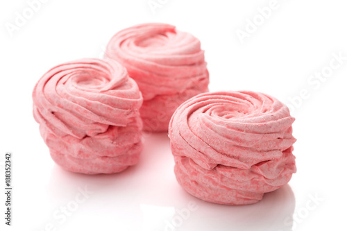 Homemade pink zephyr or marshmallow isolated on white