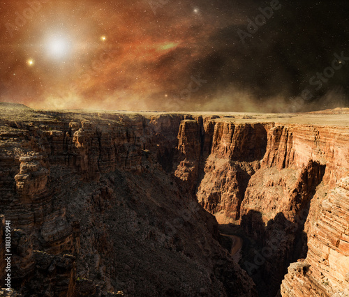 Fototapeta Naklejka Na Ścianę i Meble -  solar light on rocky cliff of the red planet