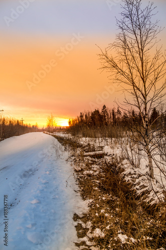 Sunset over the winter road