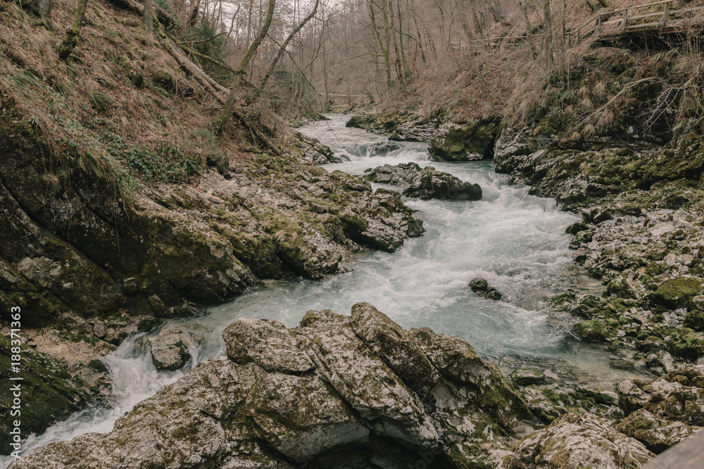 Flowing river. Natural cascade. Vintgar Gorge, Slovenia Flowing river. Natural cascade. Vintgar Gorge, Slovenia