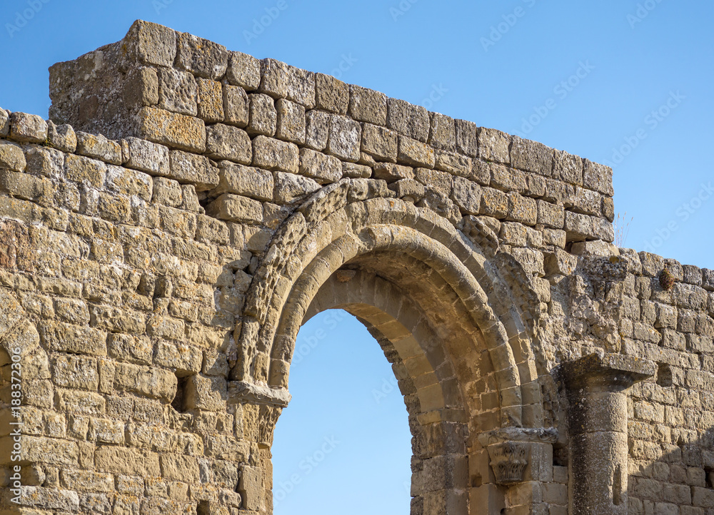 semicircular arch at the entrance of a small chapel Romanesque architecture style. half-point arch